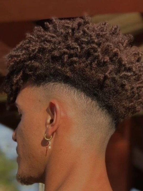 Curly Mohawk with Mid Taper Fade