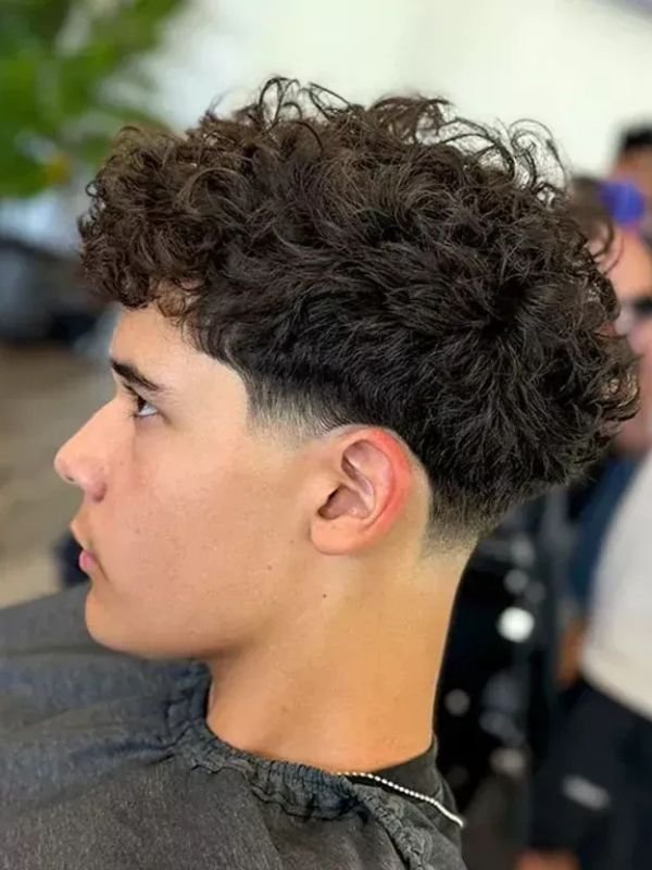 Wet Curls with Mid Taper Fade